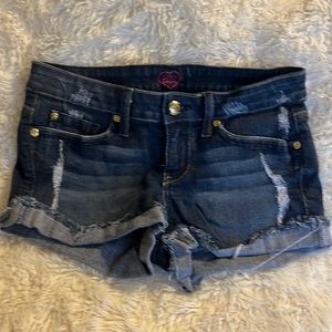 2b Bebe jean shorts. Hot pink silk pockets super cute! Size 27.